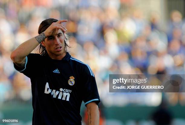 Real Madrid's defender Sergio Ramos gestures during a Spanish league football match against Malaga at Rosaleda stadium on May 16, 2010. AFP PHOTO /...