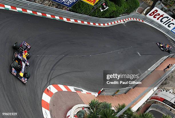 Mark Webber of Australia and Red Bull Racing leads from team mate Sebastian Vettel of Germany and Red Bull Racing on his way to winning the Monaco...