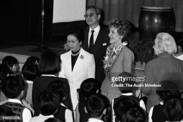 Nancy Reagan, wife of U.S. President Ronald Reagan and Tsuta Nakasone, wife of Japanese Prime Minister Yasuhiro Nakasone visit an elementary school...