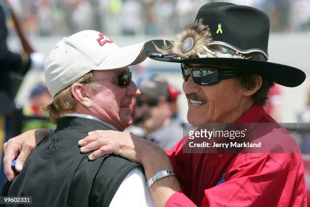 Team owners Richard Childress and Richard Petty hug on the grid prior to the start of the NASCAR Sprint Cup Series Autism Speaks 400 at Dover...