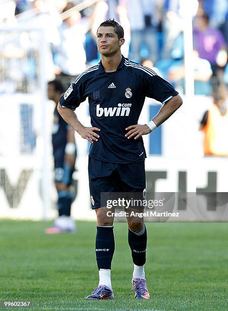 Cristiano Ronaldo of Real Madrid looks dejected during the La Liga match between Malaga and Real Madrid at La Rosaleda Stadium on May 16, 2010 in...