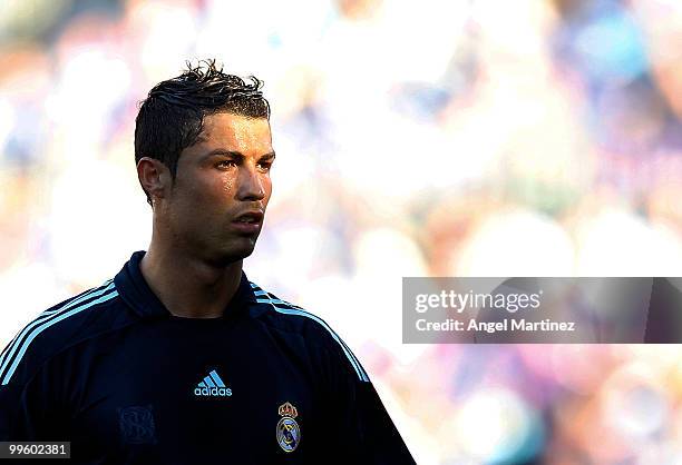 Cristiano Ronaldo of Real Madrid looks on during the La Liga match between Malaga and Real Madrid at La Rosaleda Stadium on May 16, 2010 in Malaga,...