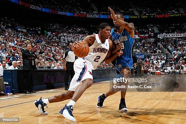 Joe Johnson of the Atlanta Hawks against Rashard Lewis of the Orlando Magic during Game Four of the Eastern Conference Semifinals of the 2010 NBA...