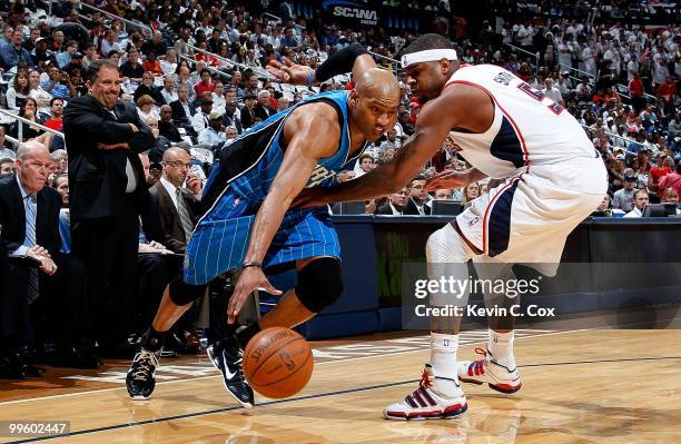 Vince Carter of the Orlando Magic against Josh Smith the Atlanta Hawks during Game Four of the Eastern Conference Semifinals of the 2010 NBA Playoffs...