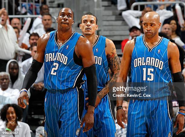 Dwight Howard, Matt Barnes and Vince Carter of the Orlando Magic against the Atlanta Hawks during Game Four of the Eastern Conference Semifinals of...