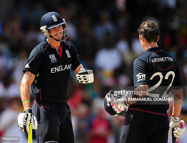 English batsman Kevin Pietersen and Craig Kieswetter celebrate a boundary shot during the Men's ICC World Twenty20 final match between Australia and...