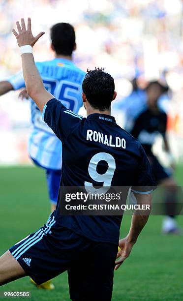 Real Madrid's Portuguese forward Cristiano Ronaldo gestures during a Spanish league football match against Malaga at Rosaleda stadium on May 16,...