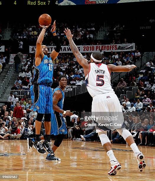Vince Carter of the Orlando Magic against Josh Smith of the Atlanta Hawks during Game Four of the Eastern Conference Semifinals of the 2010 NBA...
