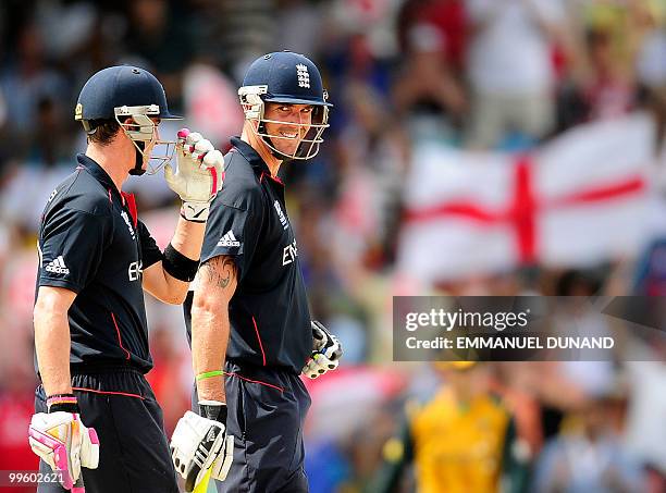 English batsman Kevin Pietersen and Craig Kieswetter celebrate a boundary during the Men's ICC World Twenty20 final match between Australia and...