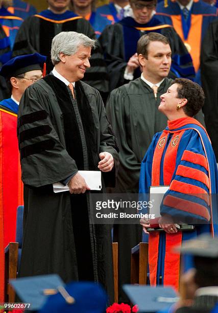 James "Jamie" Dimon, chairman and chief executive officer of JPMorgan Chase & Co., and Nancy Cantor, Syracuse University chancellor, attend the...