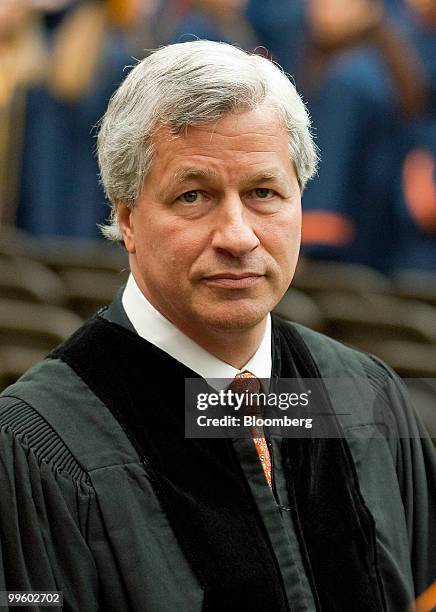 James "Jamie" Dimon, chairman and chief executive officer of JPMorgan Chase & Co., enters the Carrier Dome during Syracuse University's commencement...