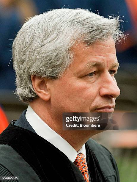 James "Jamie" Dimon, chairman and chief executive officer of JPMorgan Chase & Co., enters the Carrier Dome during Syracuse University's commencement...