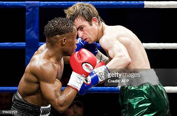 Portuguese veteran Antonio Joao Bento clashes with Innocent Anyanwu, the Netherlander of Nigerian origin, during a fight for a vacant EBA super...