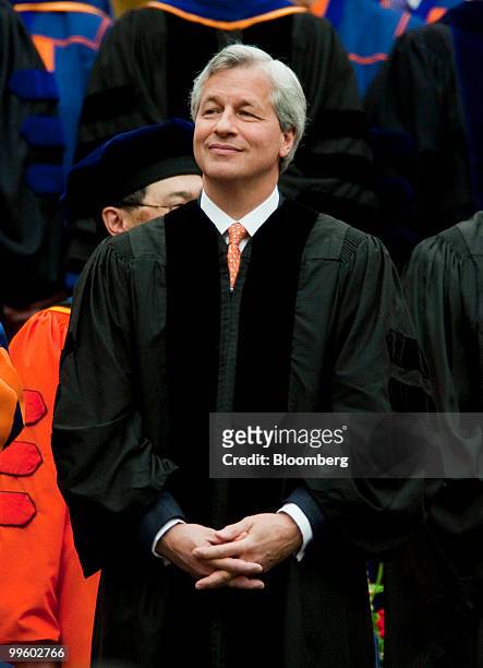 James "Jamie" Dimon, chairman and chief executive officer of JPMorgan Chase & Co., attends Syracuse University's commencement ceremony at the Carrier...