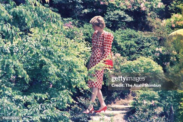 Princess Diana, Princess of Wales strolls the garden of the Shugakuin Imperial Villa on May 9, 1986 in Kyoto, Japan.