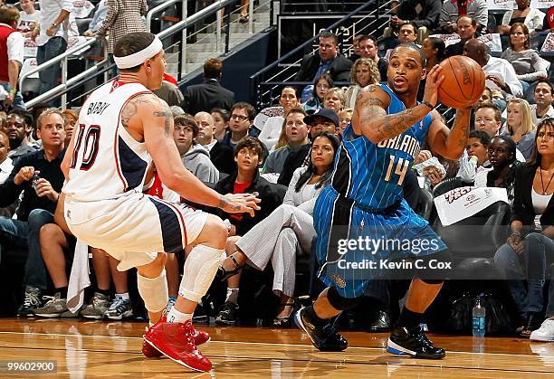 Jameer Nelson of the Orlando Magic against Mike Bibby of the Atlanta Hawks during Game Four of the Eastern Conference Semifinals of the 2010 NBA...