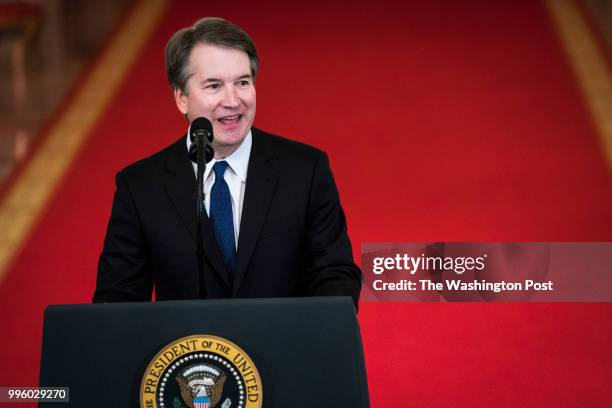 Judge Brett M. Kavanaugh of the District of Columbia Circuit, speaks with President Donald J. Trump speaks during an announcement ceremony for the...