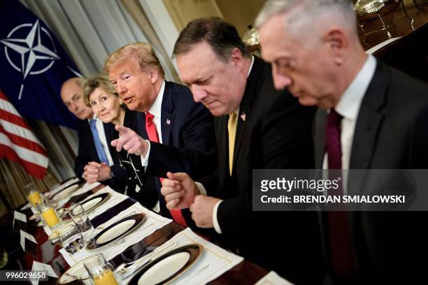 White House Chief of Staff John Kelly, US Ambassador to NATO Kay Bailey Hutchison, US President Donald Trump, US Secretary of State Mike Pompeo and...