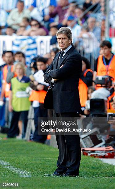 Real Madrid coach Manuel Pellegrini looks on during the La Liga match between Malaga and Real Madrid at La Rosaleda Stadium on May 16, 2010 in...