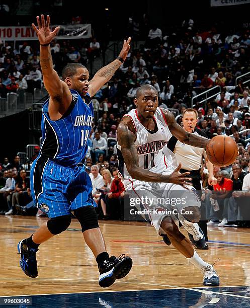Jameer Nelson of the Orlando Magic against Jamal Crawford of the Atlanta Hawks during Game Four of the Eastern Conference Semifinals of the 2010 NBA...