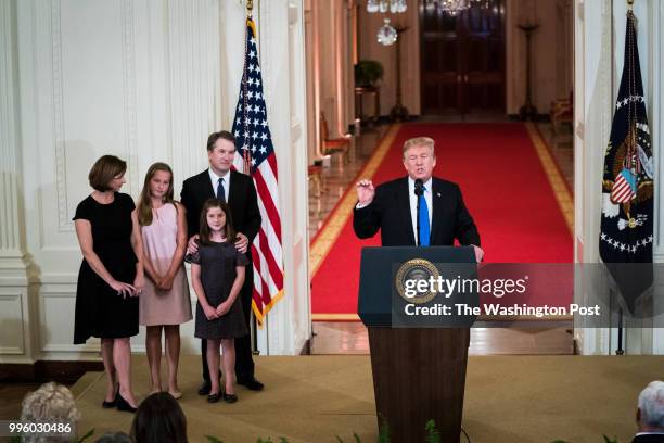 Judge Brett M. Kavanaugh of the District of Columbia Circuit, and his family listen as President Donald J. Trump speaks during an announcement...