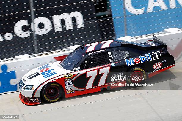 Sam Hornish Jr., driver of the Mobil 1 Dodge, crashes into the wall during the NASCAR Sprint Cup Series Autism Speaks 400 at Dover International...