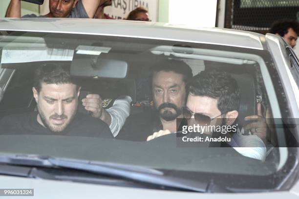 Televangelist Adnan Oktar is brought to the Police Department following his arrest for alleged membership of a criminal organization after an...