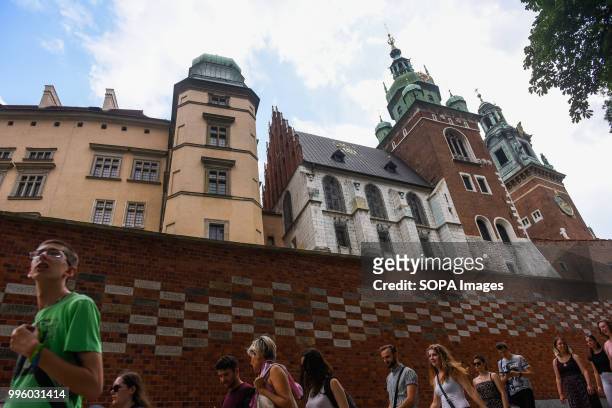 Tourists are seen at Wawel Castle. Krakow is the second largest city in Poland and it is located in the southern part of the country.