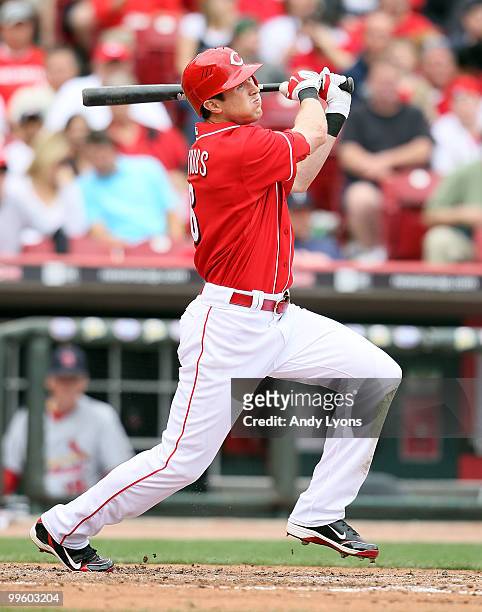 Drew Stubbs of the Cincinnati Reds hits a double during the game against the St. Louis Cardinals at Great American Ball Park on May 16, 2010 in...