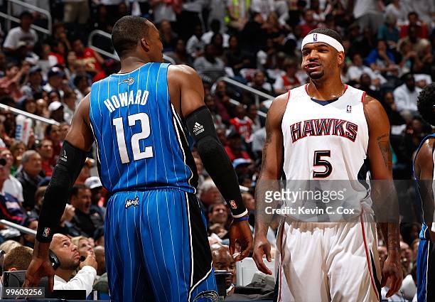 Dwight Howard of the Orlando Magic against Josh Smith of the Atlanta Hawks during Game Four of the Eastern Conference Semifinals of the 2010 NBA...