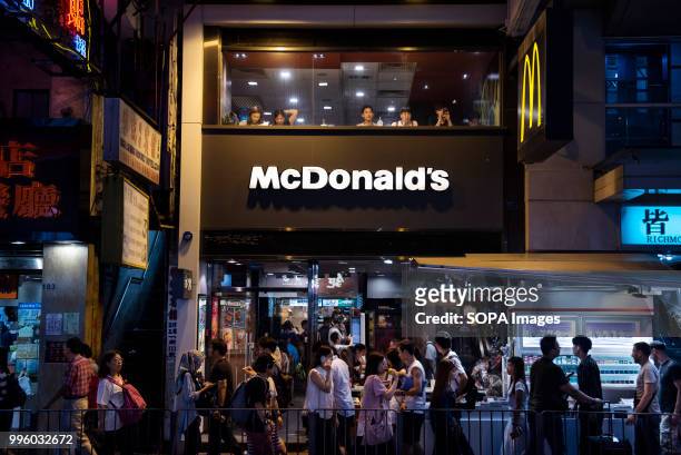 Customer eat at multinational American fast food McDonald's restaurant in Hong Kong.