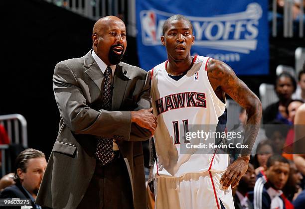 Head coach Mike Woodson and Jamal Crawford of the Atlanta Hawks against the Orlando Magic during Game Four of the Eastern Conference Semifinals of...