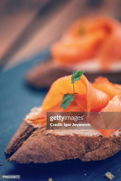 smoked salmon and cream cheese on toast - smoked cheese stock pictures, royalty-free photos & images