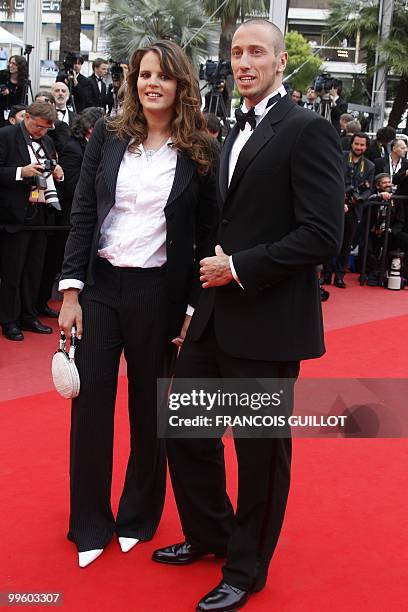 French swimmer Frederick Bousquet and French former swimmer Laure Manaudou arrive for the screening of "La Princesse de Montpensier" presented in...