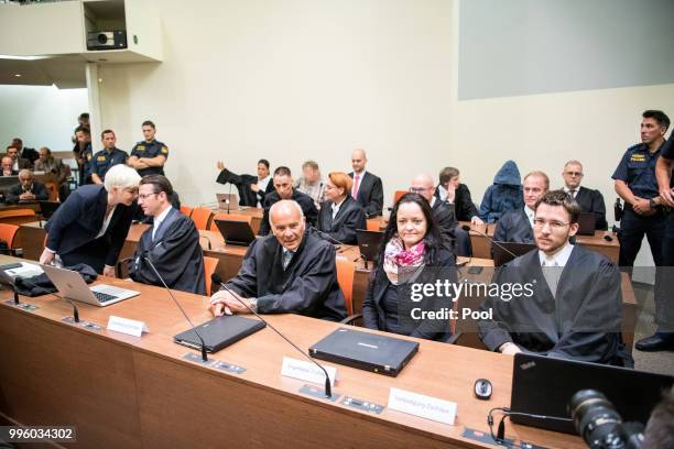 Defendant Beate Zschaepe, co-defendants and legal teams wait at Oberlandesgericht courthouse on the day judges are to announce their verdict in the...