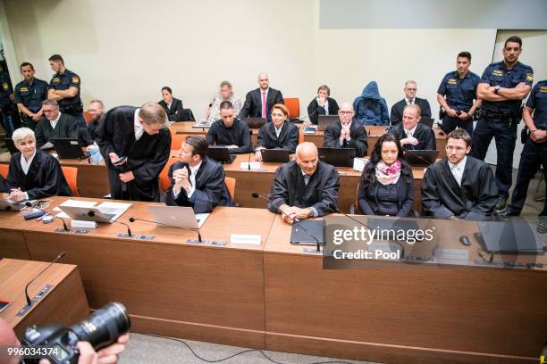 Defendant Beate Zschaepe, co-defendants and legal teams wait at Oberlandesgericht courthouse on the day judges are to announce their verdict in the...