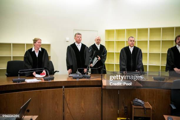 The judges arrive at Oberlandesgericht courthouse on the day judges are to announce their verdict in the marathon NSU neo-Nazi murder trial on July...