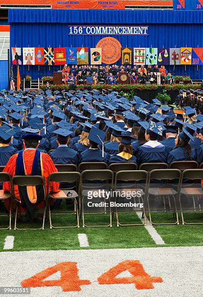 Graduates attend Syracuse University's commencement ceremony at the Carrier Dome in Syracuse, New York, U.S., on Sunday, May 16, 2010. Students...