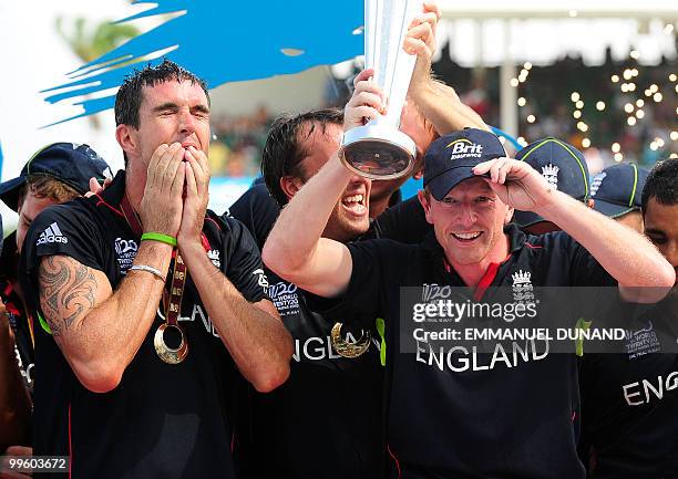 English captain Paul Collingwood and Kevin Pietersen celebrate with the trophy as England won the Men's ICC World Twenty20 final match between...