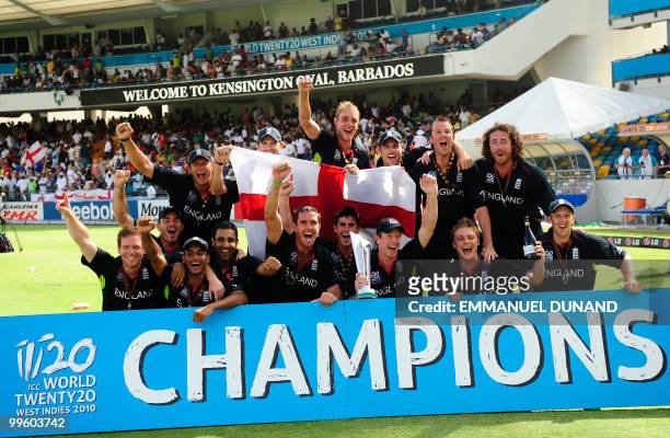 English players celebrate with the trophy as England won the Men's ICC World Twenty20 final match between Australia and England at the Kensington...