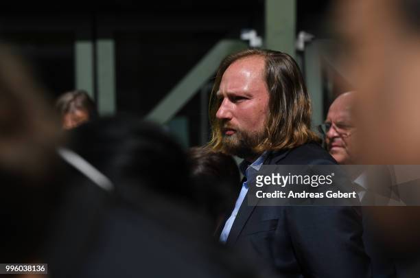 Anton Hofreiter, leader of the faction of the Green party in the German Bundestag, talks to the media outside the Oberlandesgericht courthouse after...