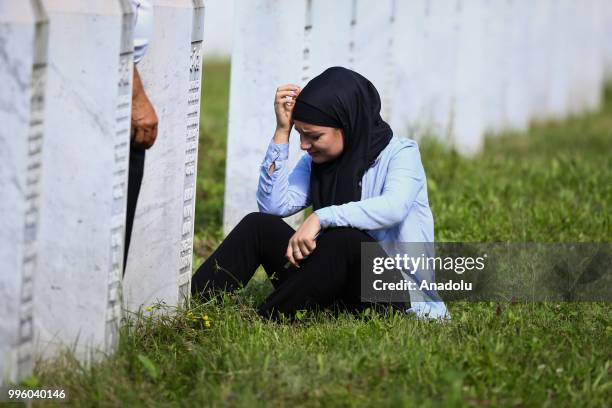 Relative of Srebrenica victim waits for burial of 35 victims at the Potocari Monument Cemetery in Srebrenica, Bosnia and Herzegovina on July 11,...