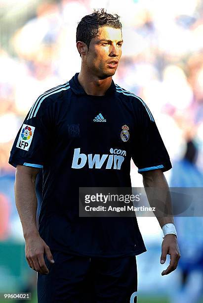 Cristiano Ronaldo of Real Madrid looks on during the La Liga match between Malaga and Real Madrid at La Rosaleda Stadium on May 16, 2010 in Malaga,...