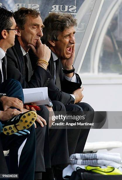 Head coach Manuel Pellegrini of Real Madrid gestures during the La Liga match between Malaga and Real Madrid at La Rosaleda Stadium on May 16, 2010...