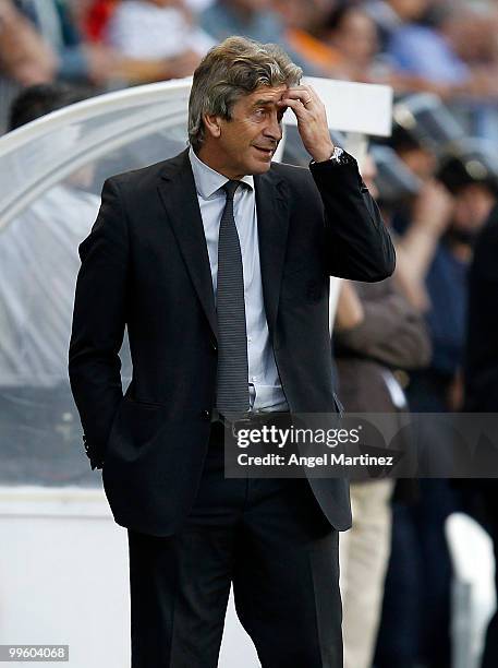 Head coach Manuel Pellegrini of Real Madrid gestures during the La Liga match between Malaga and Real Madrid at La Rosaleda Stadium on May 16, 2010...