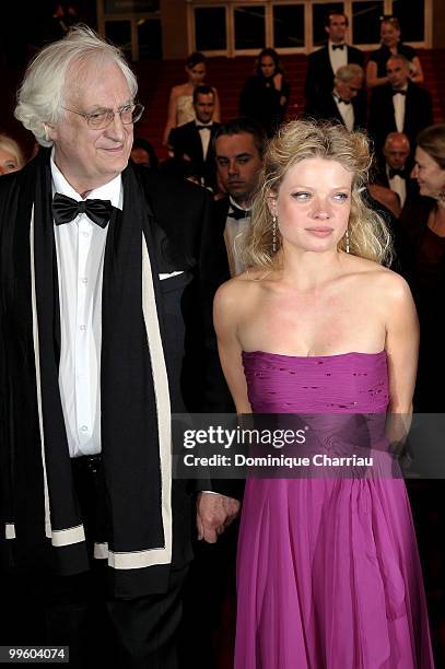 Director Bertrand Tavernier and actress Melanie Thierry depart the 'The Princess of Montpensier' Premiere held at the Palais des Festivals during the...