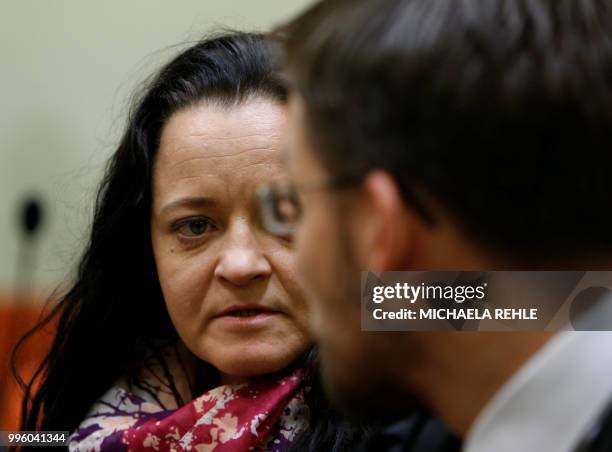 Lawyer Mathias Grasel and defendant Beate Zschaepe wait in a Munich courtroom before the proclamation of sentence in her trial as the only surviving...