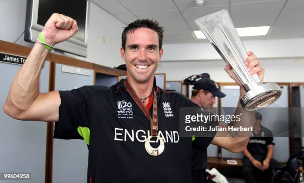 England player Kevin Pietersen with the trophy for player of the tournament in the teams dressing room after his teams victory against Australia in...
