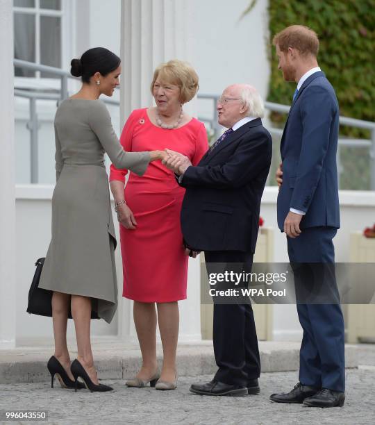 Prince Harry, Duke of Sussex and Meghan, Duchess of Sussex meet Ireland's President, Michael Higgins and his wife Sabina Coyne at Aras an Uachtarain...