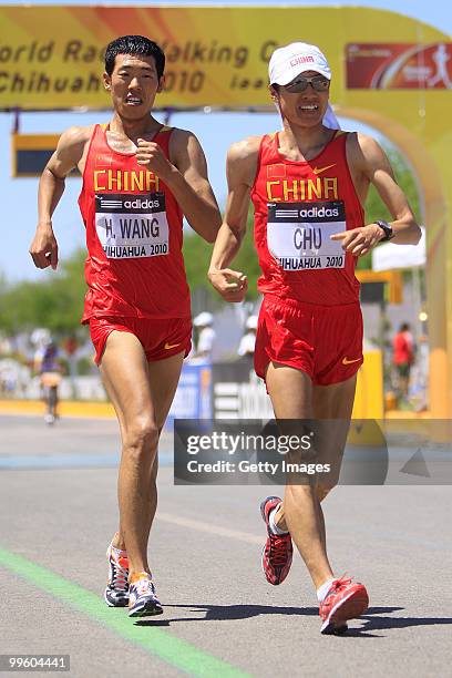 Hao Wang and Yafei Zhu of China compete during the mens 20 Km Walking race competition at the IAAF World Race Walking Cup Chihuahua 2010 at Deportiva...